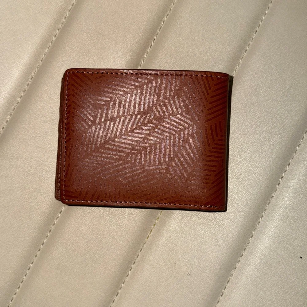 Fossil Tan Geometric Embossed Leather Bifold Wallet